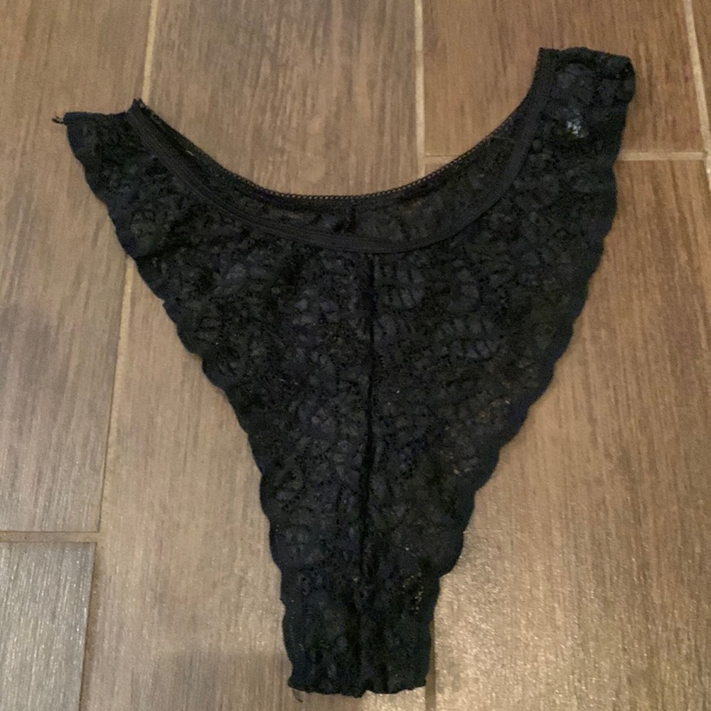 Sexy black lacy panties. “One size fits all”.